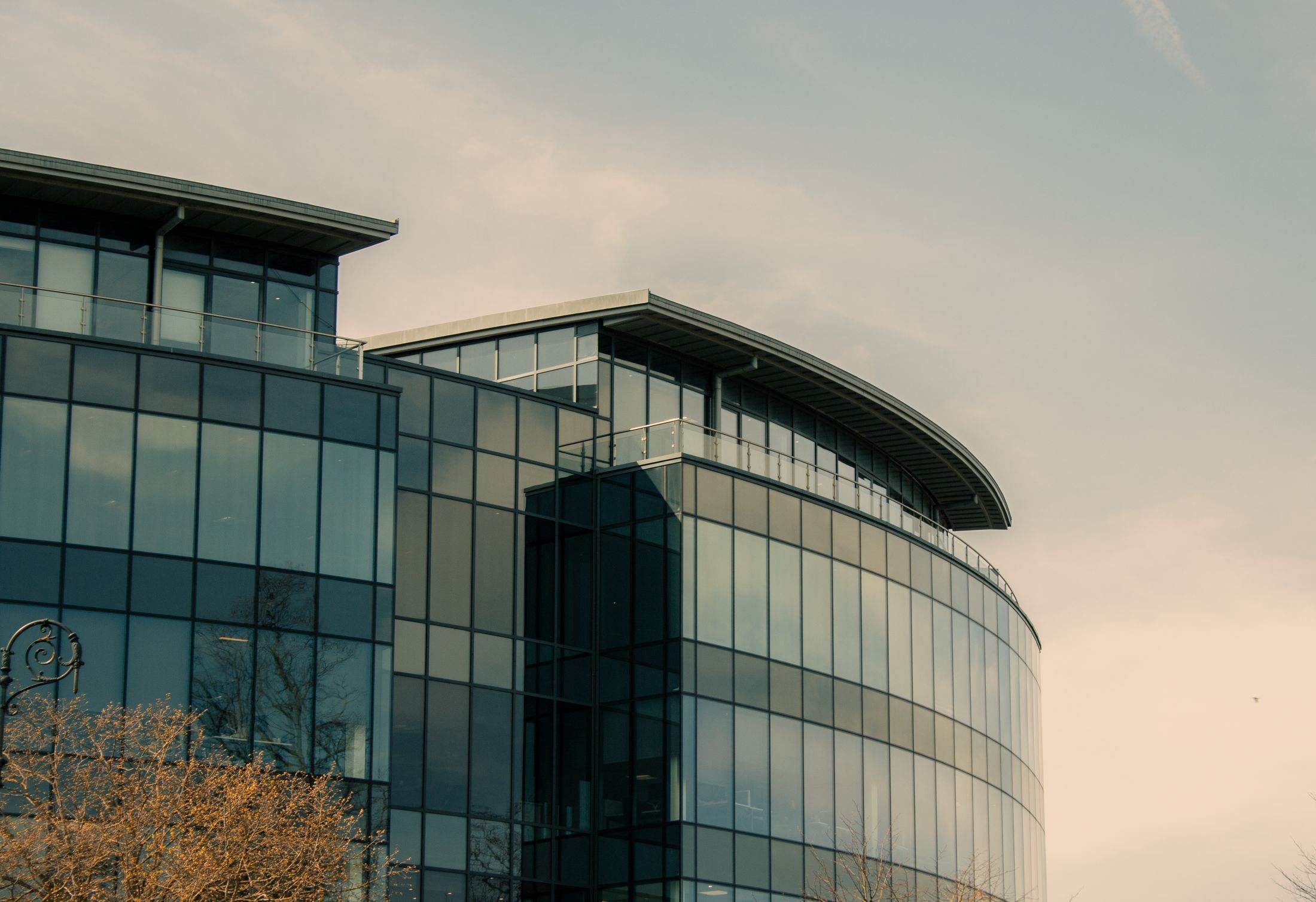 A modern glass-fronted office building in Chester